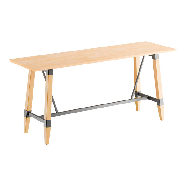 A rectangular bar height table with a solid wood top in a bleached oak finish and a trestle base featuring metal supports.