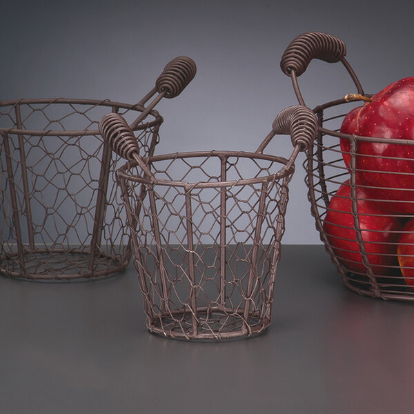 Three Libbey wire pails filled with red apples.