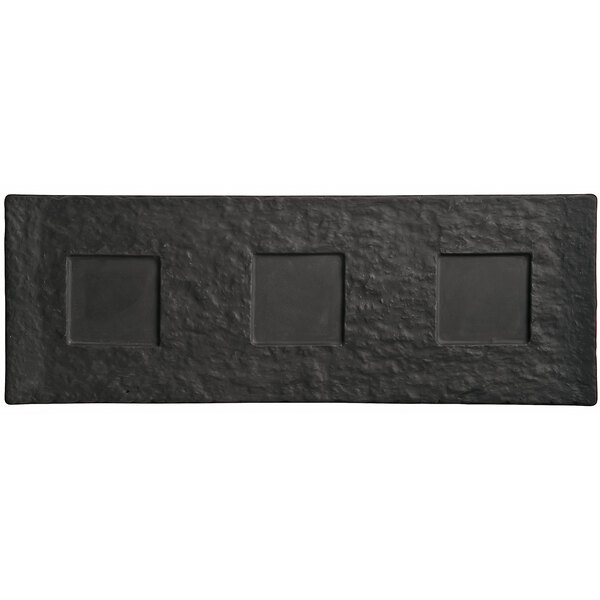 A black rectangular tray with three square wells.
