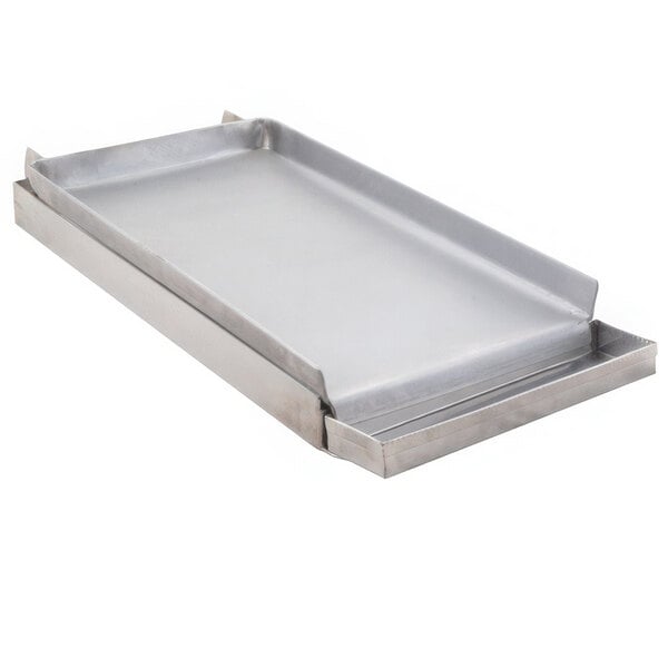 A stainless steel metal griddle tray with a handle.