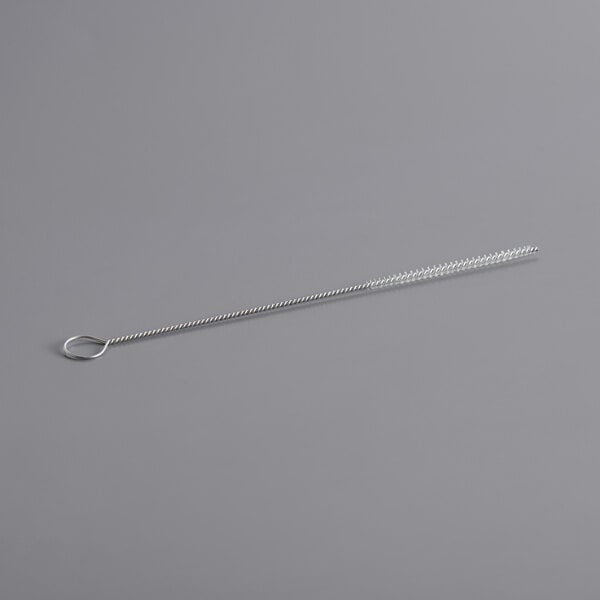 A Carlisle Sparta Spectrum metal pipe brush with a silver ring on the end.