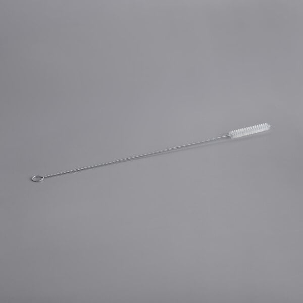 A cleaning brush with a long silver metal rod and gray bristles.