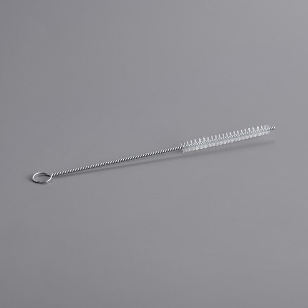 A long metal rod with a white handle.