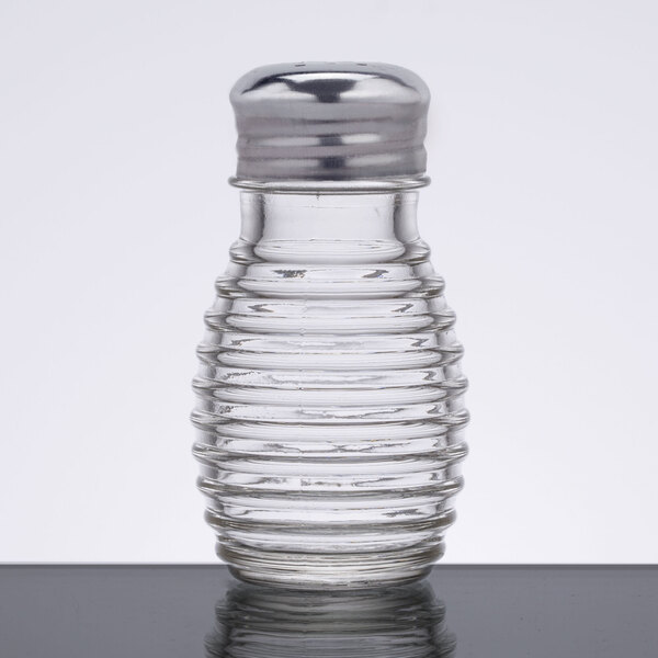 An American Metalcraft beehive salt shaker with a silver top.