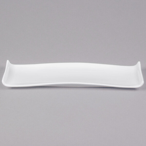 An American Metalcraft white rectangular porcelain serving platter with a curved edge.