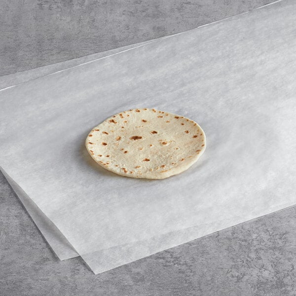 Mission flour tortilla on a white surface.