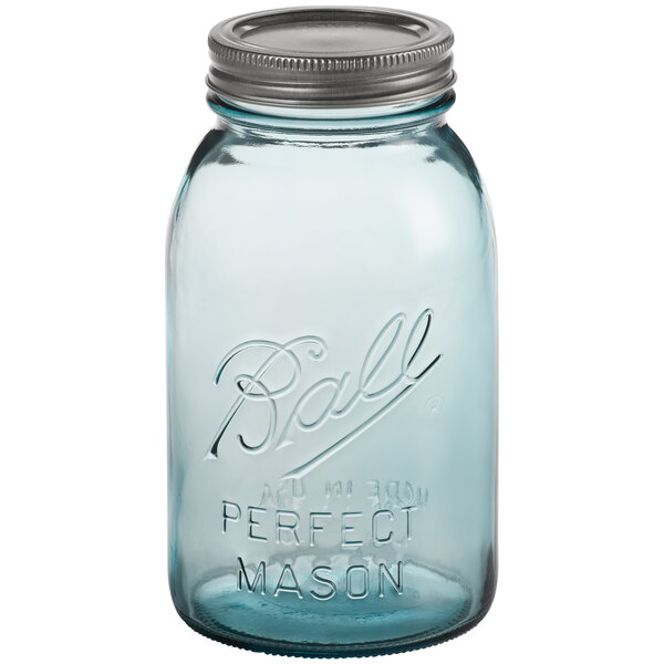 Aqua blue glass Ball canning jar with silver lid.