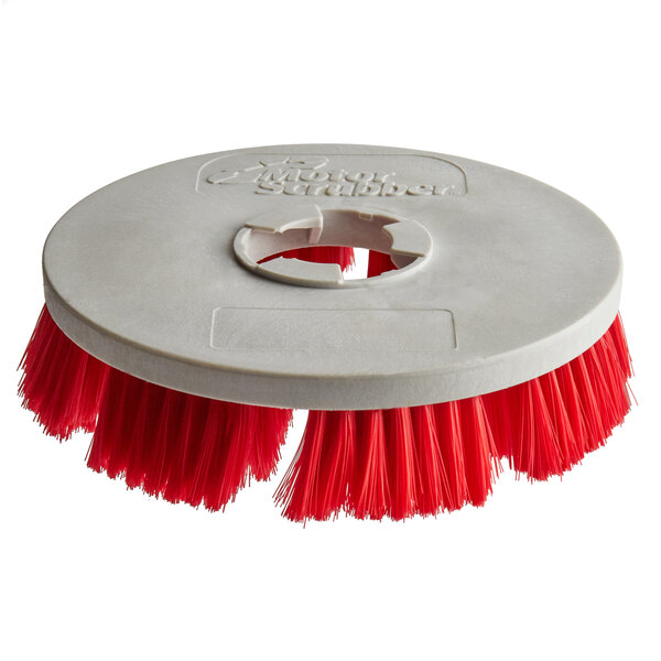A close-up of a red MotorScrubber medium duty brush with a white plastic disc.
