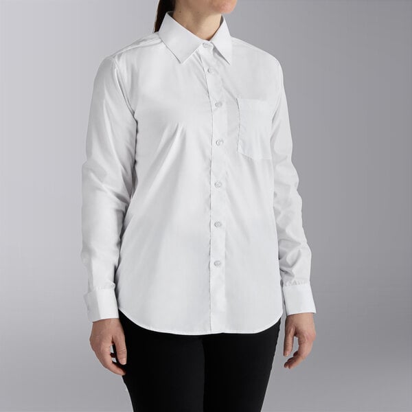 A woman wearing a white Henry Segal long sleeve dress shirt.