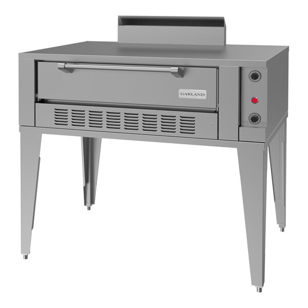 A large, stainless steel single deck pizza oven designed for commercial use.