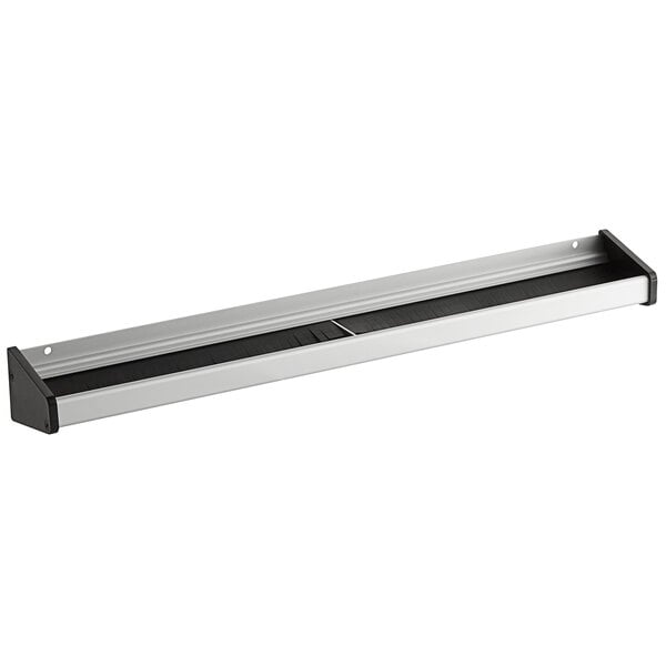 A metal shelf with black and grey rectangular objects on it.