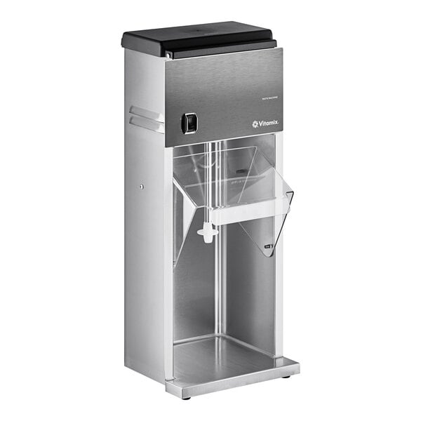 A stainless steel Vitamix countertop frozen dessert mixer with a lid.
