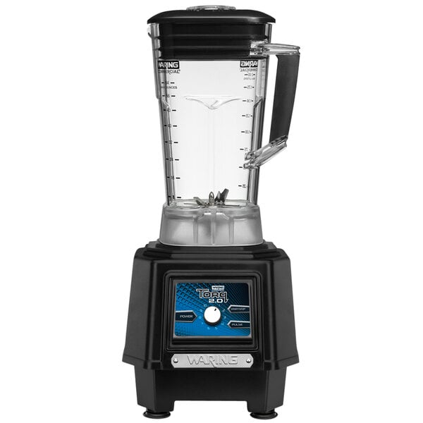 A black and silver Waring commercial blender with a clear jar.