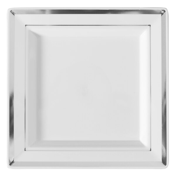 A white square plate with silver trim.