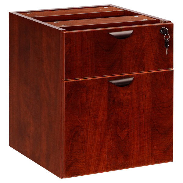 a wooden file cabinet with a key