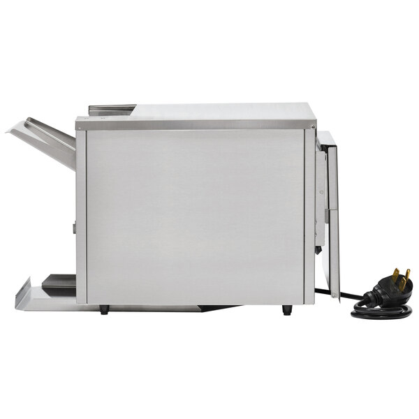 A Vollrath convertible conveyor toaster machine with a plug.