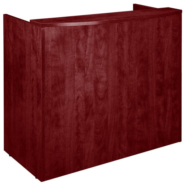 A Boss mahogany laminate reception desk shell.