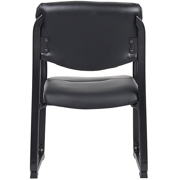 A Boss Black LeatherPlus side chair with black metal legs.