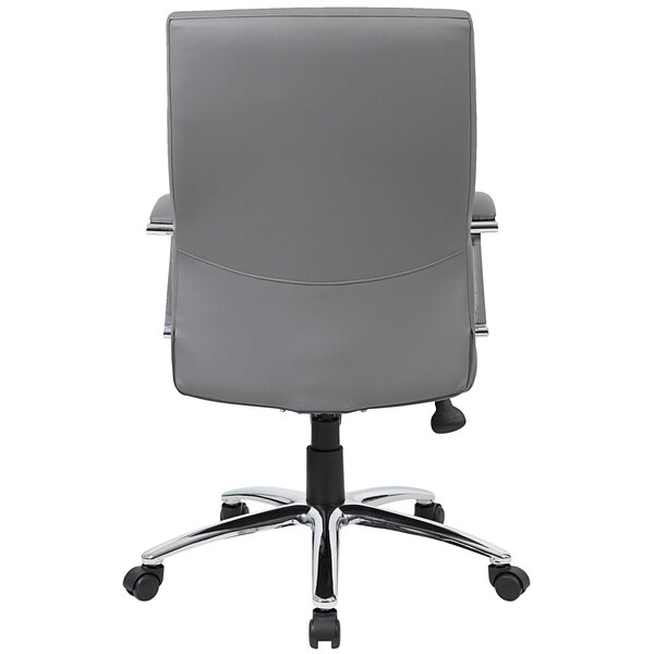 A gray Boss LeatherPlus executive office chair with wheels and a black base with chrome legs.