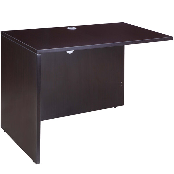 A dark brown laminate Boss return desk.