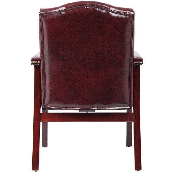 The back of a Boss Ivy League burgundy vinyl guest chair with mahogany finish.