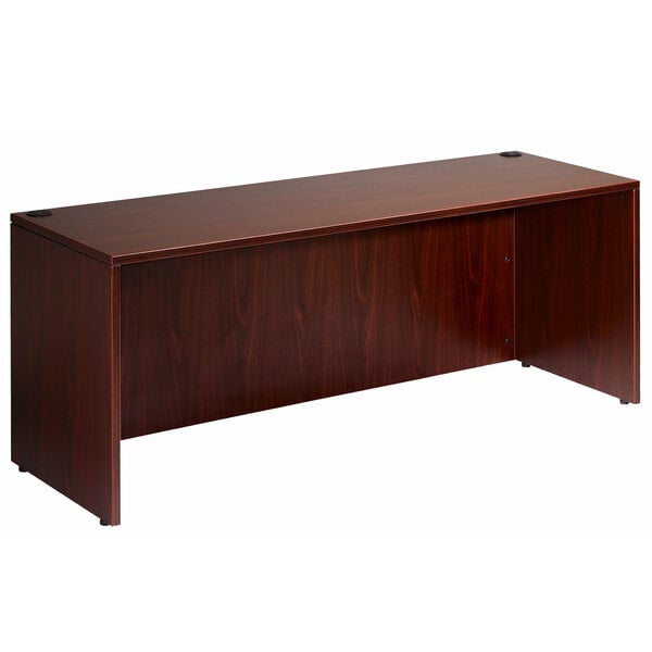 A Boss mahogany laminate rectangular desk shell on a white background.