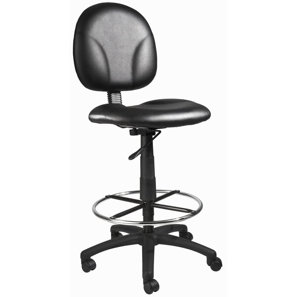 A Boss black drafting stool with a round base.