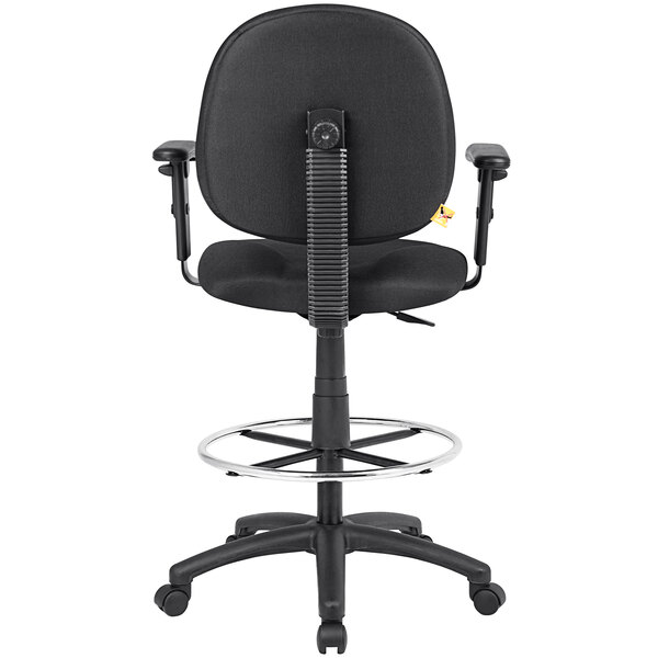 A black Boss drafting stool with adjustable arms and a footring.