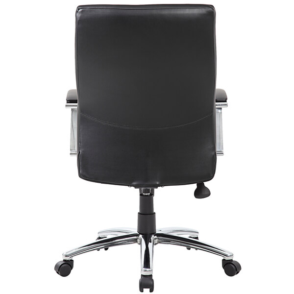 A black office chair with chrome base and black leather seat.
