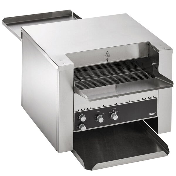 A stainless steel Vollrath convertible conveyor toaster on a counter.