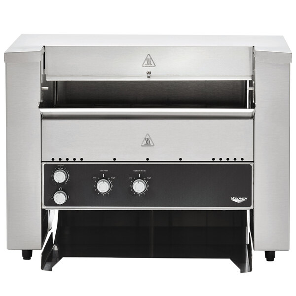 A Vollrath stainless steel conveyor toaster on a counter.