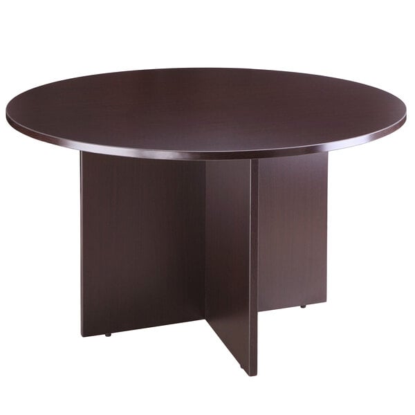 A Boss mocha laminate round office table.