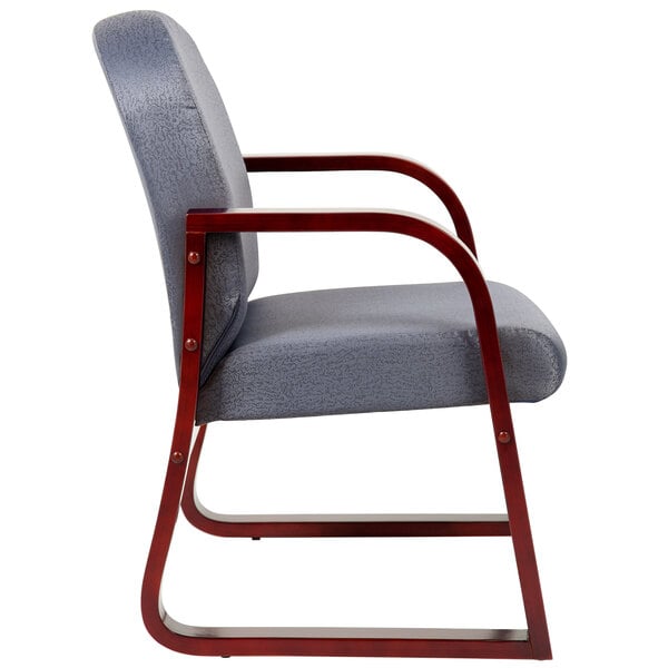 A gray fabric Boss side chair with a wooden frame.