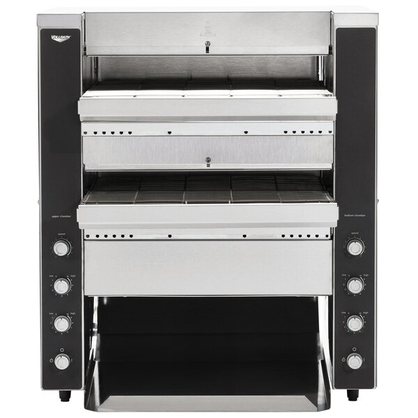 A black and silver Vollrath dual conveyor toaster with two openings.