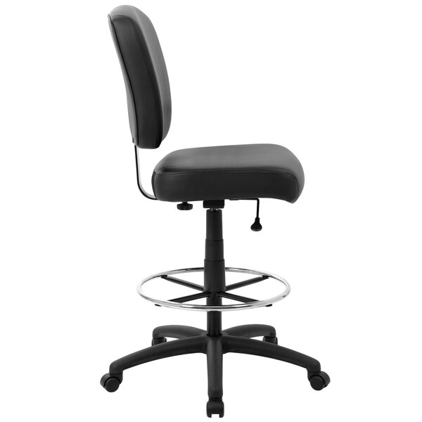 A Boss black drafting stool with a metal base.