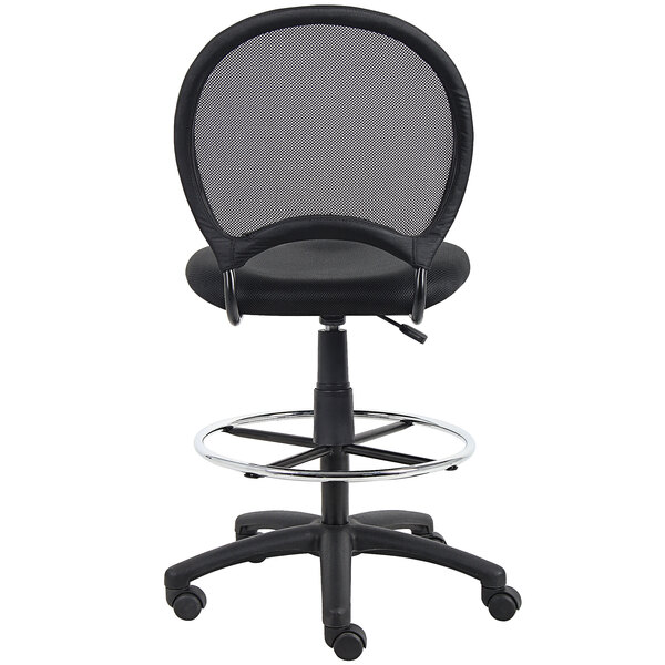 A Boss black mesh drafting stool with a metal base.