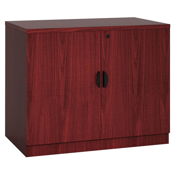 A mahogany laminate storage cabinet with two doors and two drawers.