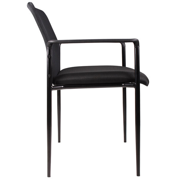 A Boss black mesh guest chair with black fabric cushions.