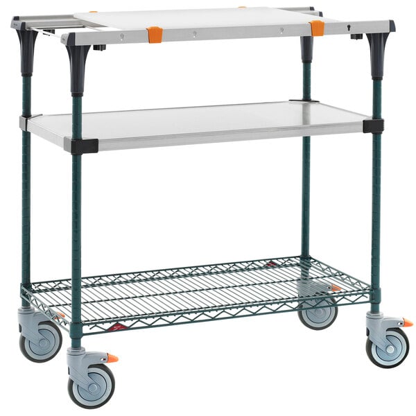 A Metro PrepMate MultiStation cart with a metal shelf and wheels.