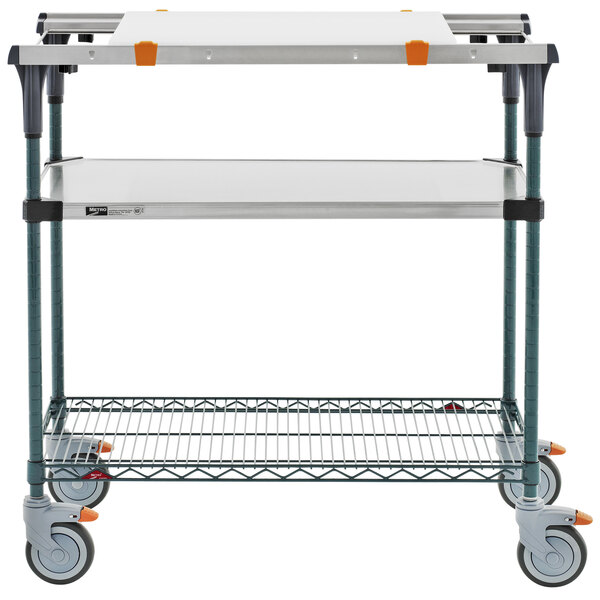 A Metro PrepMate MultiStation with wheels and a shelf.
