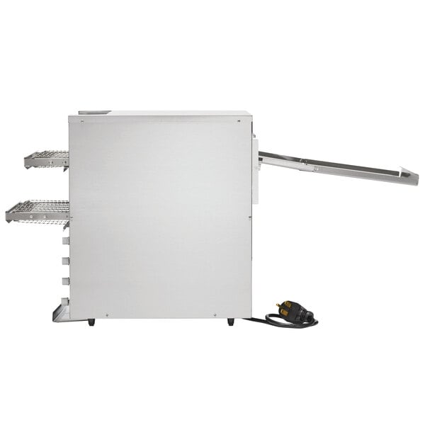 A white Vollrath dual conveyor toaster with metal shelves.
