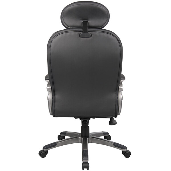 The back of a black Boss Pillow Top Executive Chair with armrests and a headrest.