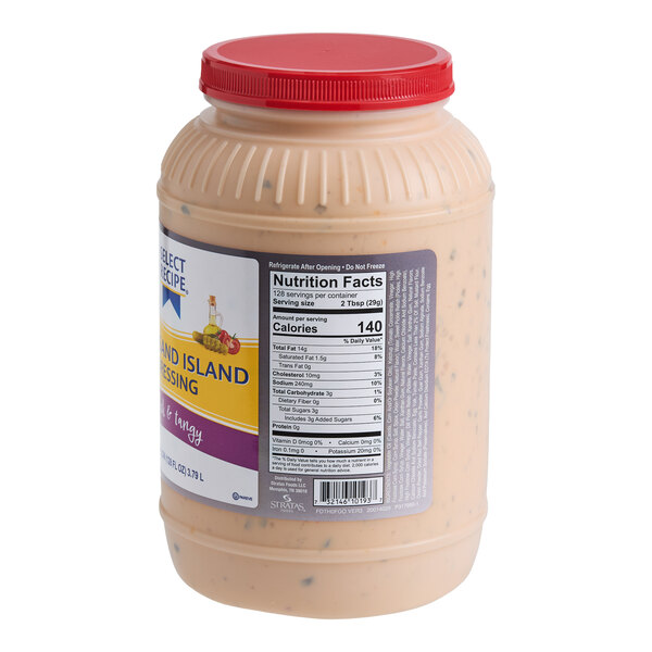 A large plastic jar of AAK Select Recipe Thousand Island Dressing with a red lid.
