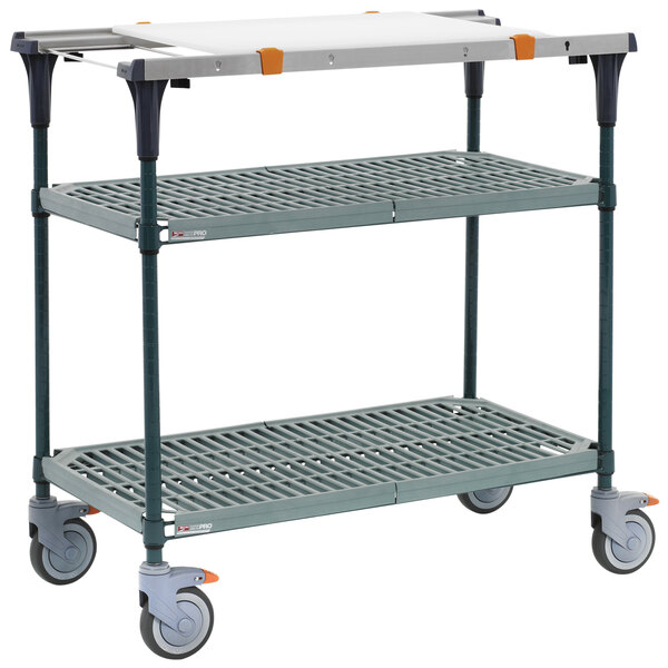 A grey Metro PrepMate MultiStation cart with three SuperErecta Pro shelves.