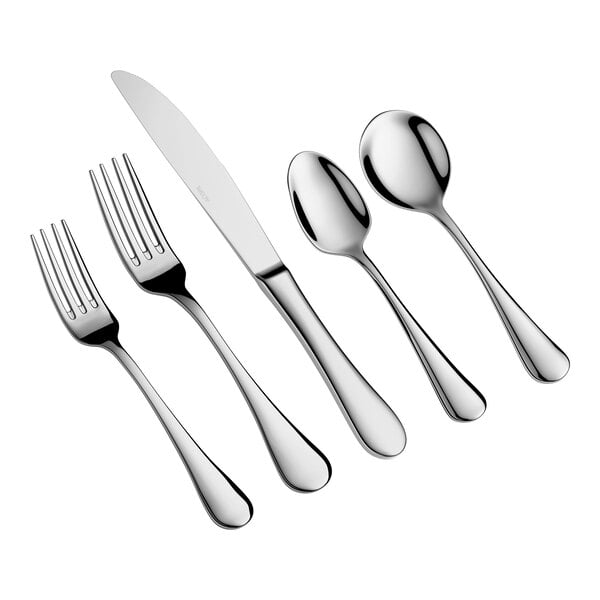 Five pieces of shiny, stainless steel flatware including two forks, a knife, and two spoons are arranged side by side on a white background.