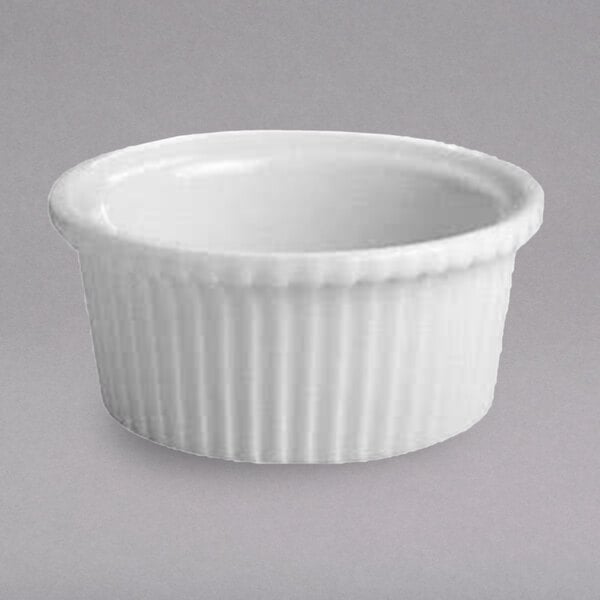 A white fluted Hall China ramekin.