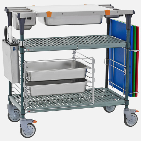 A Metro PrepMate MultiStation with trays on wheels.