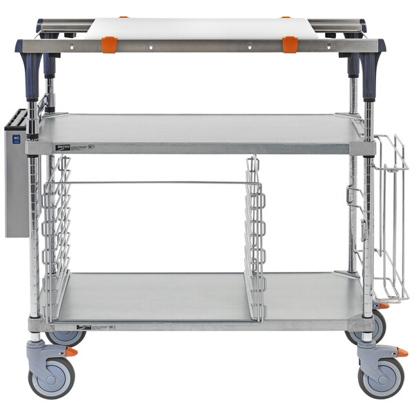 A Metro PrepMate MultiStation cart with galvanized shelving and drawers on wheels.