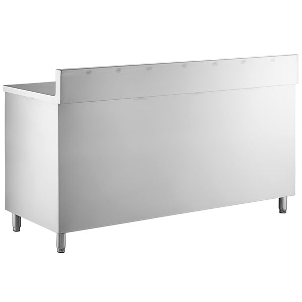 A Regency stainless steel rectangular table with sliding doors and a backsplash on legs.