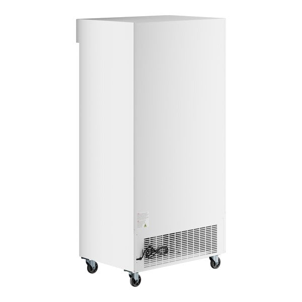 A white sliding glass door merchandiser refrigerator with LED lighting and caster wheels.
